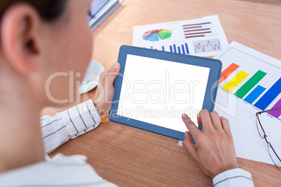 Businesswoman using her digital tablet