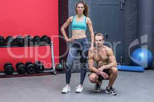 Standing and kneeling muscular couple