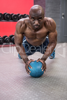 Young bodybuilder doing excercises