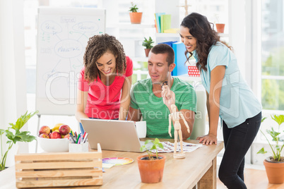 Colleagues using a computer