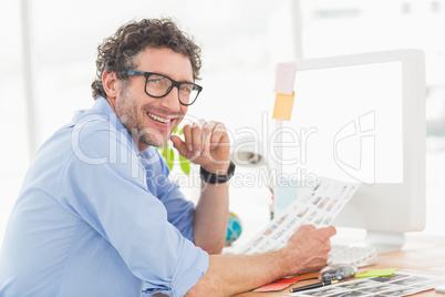 Casual businessman using computer in office