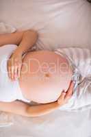 Close up view of pregnant woman belly