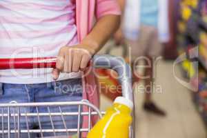 A young pretty woman buying a products