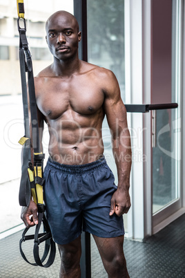 Young Bodybuilder standing in front of the camera Young Bodybuilder standing in front of the camera