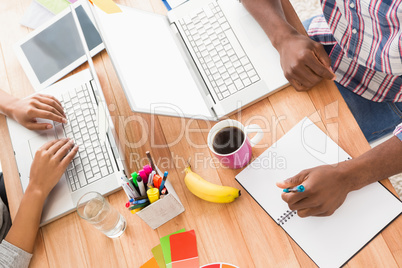 Young business people working at the laptops