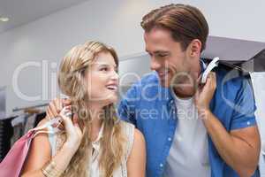 A happy couple with shopping bags