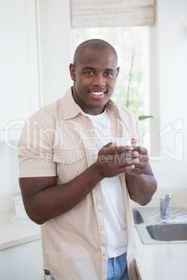 Smiling of a man  drinking tea