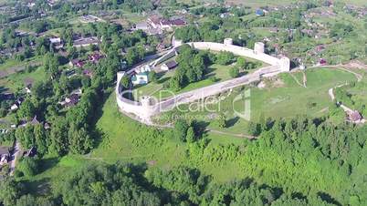 Flying Above Old Fortress and Village, sunny day