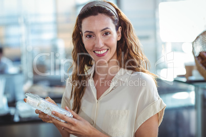 Pretty woman shopping in the bakery