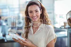 Pretty woman shopping in the bakery