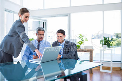 Business people working on laptop computer