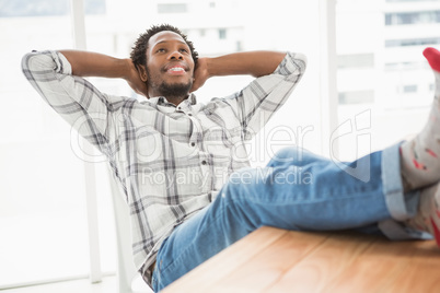 Young businessman sitting at his desk