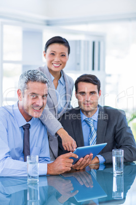 Business people working on tablet computer