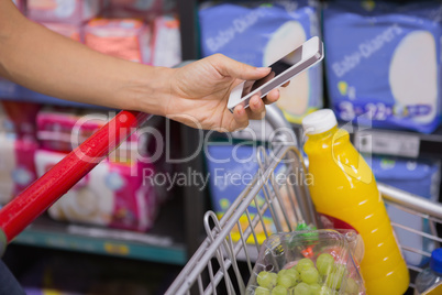 woman buy products and using his smartphone