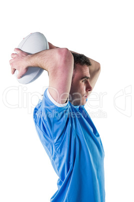 Rugby player about to throw a rugby ball