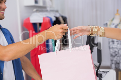 A woman taking a bag
