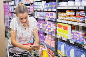 Woman buy products and texting