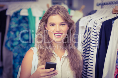A pretty blonde woman showing her credit cards