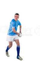 Rugby player about to throw a rugby ball