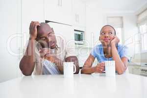 Pretty couple drinking on their cup