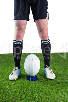 Rugby player ready to make a drop kick