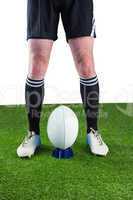 Rugby player ready to make a drop kick