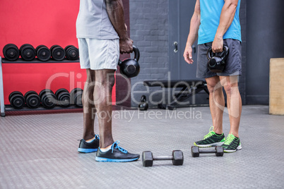 Two young Bodybuilder standing in front of each other