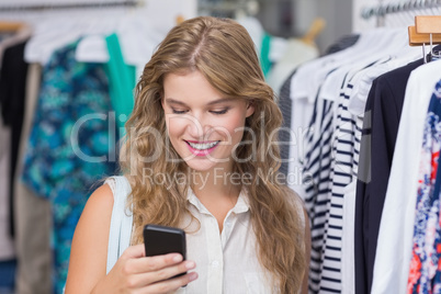 A pretty blonde woman showing her credit cards