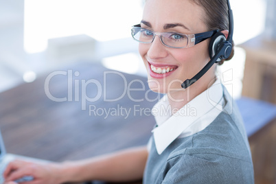 Close up view of happy businesswoman with headset