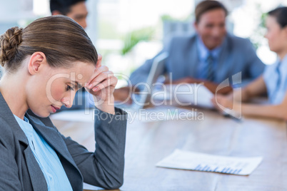 Business people speaking together during meeting