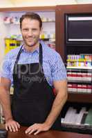 Portrait of a smiling handsome with an apron