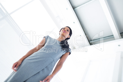 A businesswoman standing in the office