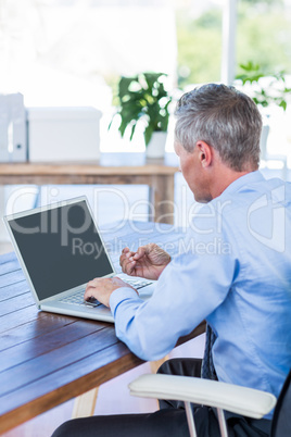 Businessman working with laptop computer