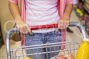 A young pretty woman buying a products