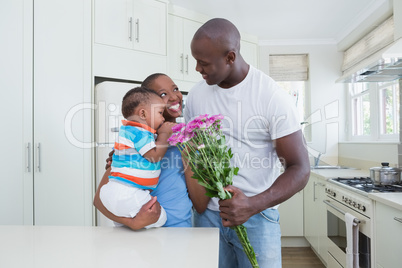 Happy smiling couple with his babyboy