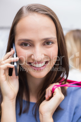 Pretty brunette talking on the phone