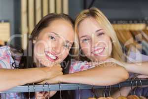 Two beautiful women smiling at camera