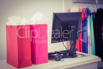 Two shopping bags on a counter