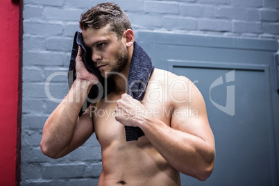 Muscular man with a towel