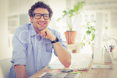 Casual businessman using computer in office