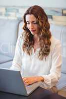 Young woman using laptop