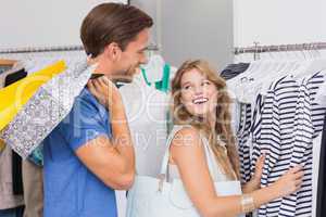 A happy couple with shopping bags