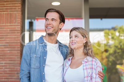 Happy couple looking far away