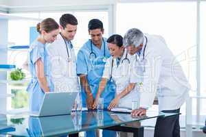 Doctors and nurses discussing together