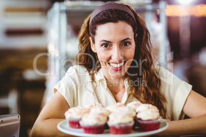 Pretty brunette smiling at camera