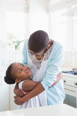 Smiling mother with her daughter