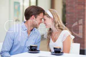 Cute couple drinking a coffee together