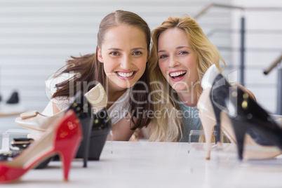 Two excited women looking at camera