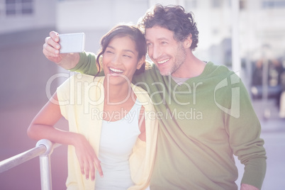 couple taking photos of themselves