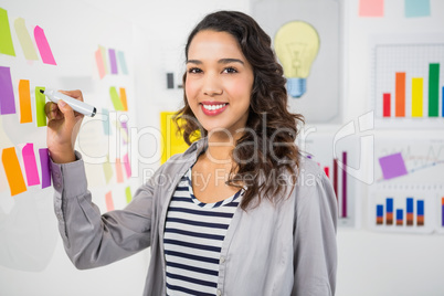 Young smiling creative businesswoman